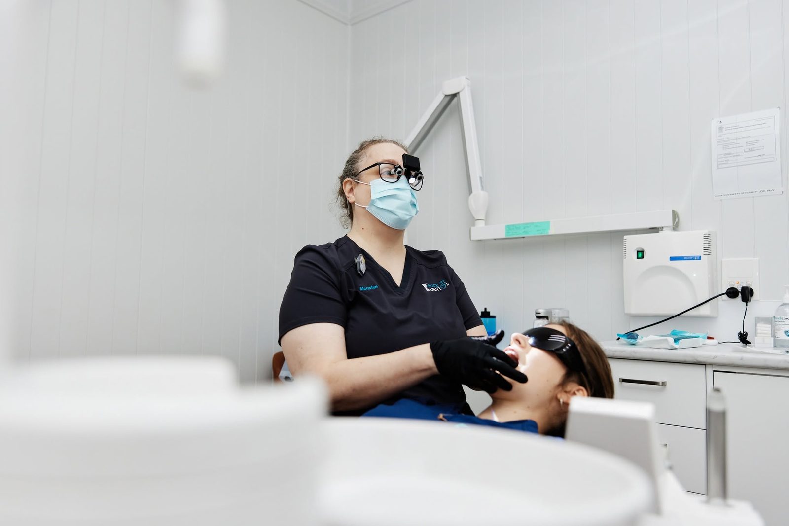 Hygienist Mary-Ann Boss examining a patient during a hygiene appointment